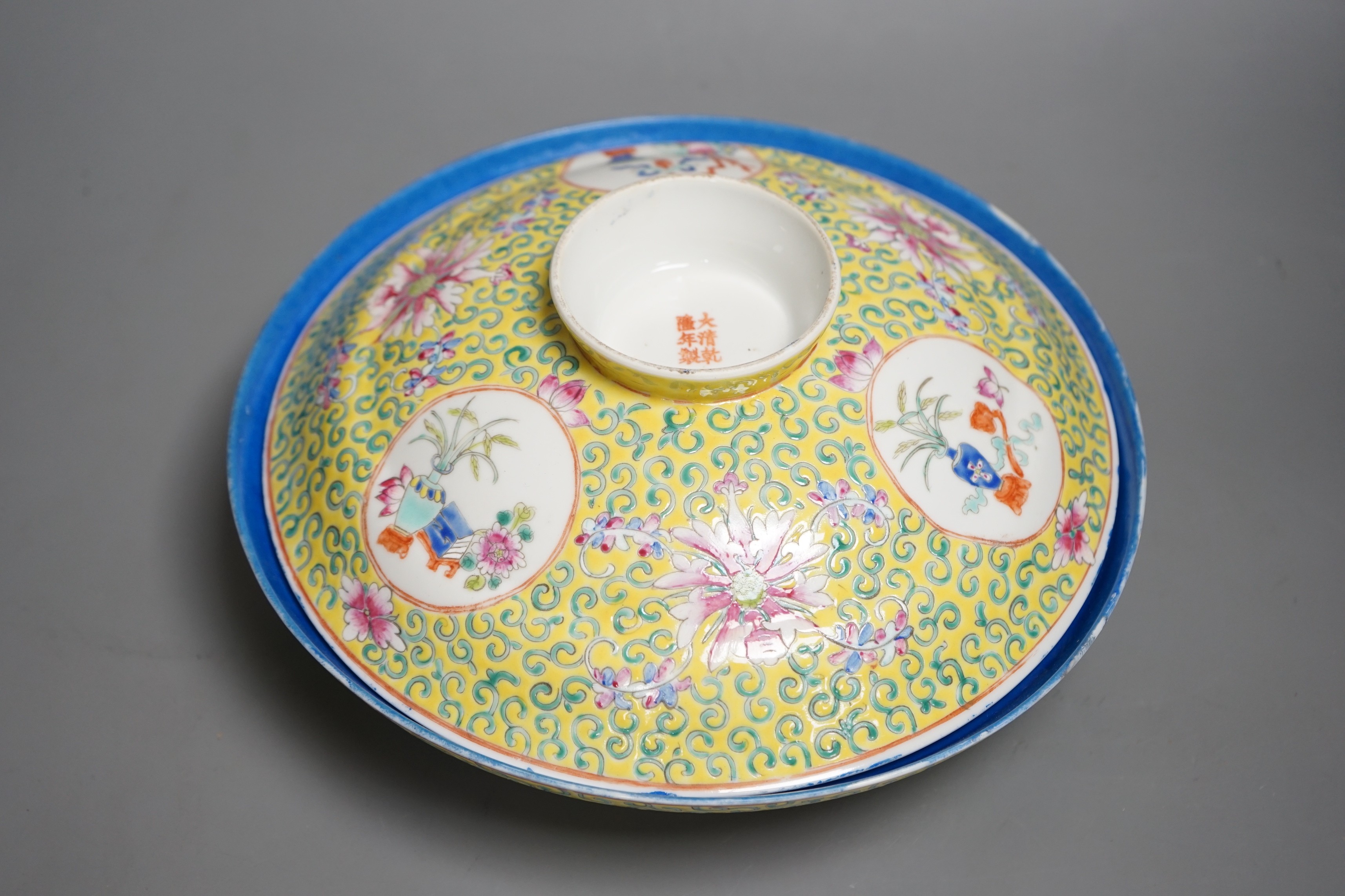 A large Chinese famille rose yellow ground bowl and cover, Republic period, 25cm diameter